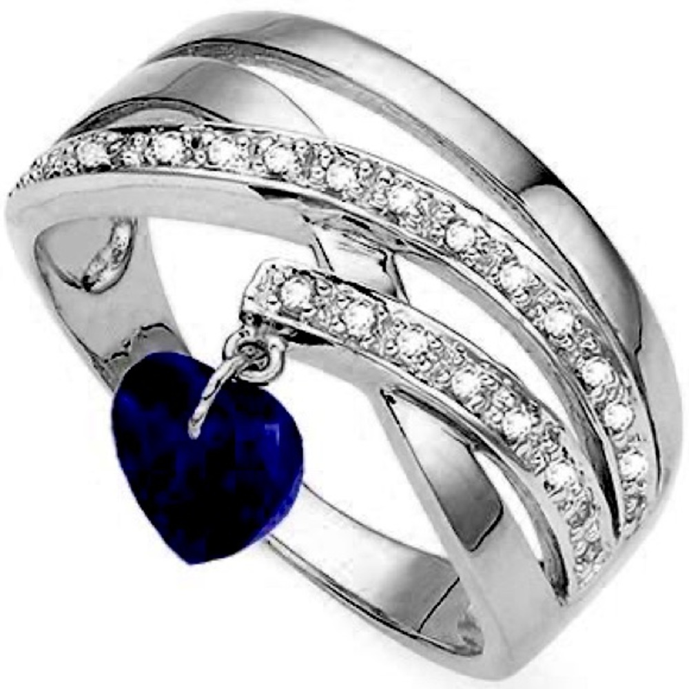 It’s white gold ring size 7 with real diamonds and sapphire